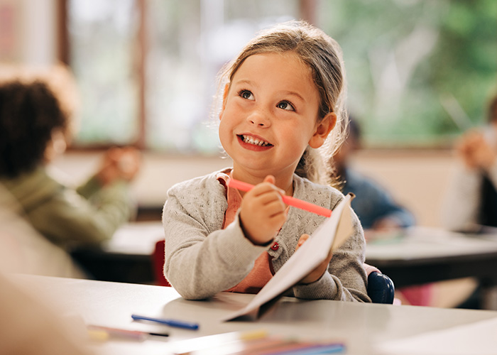 Happy student in a classroom