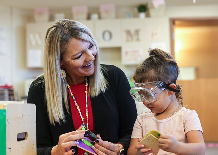 Teacher helping a student